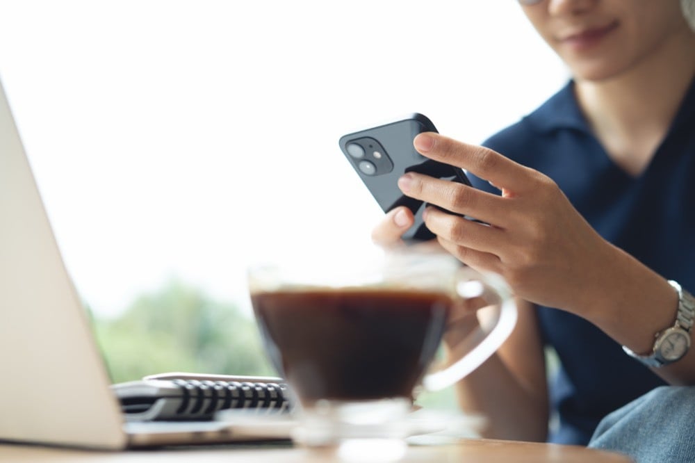 Smartphone user connected to Wi-Fi