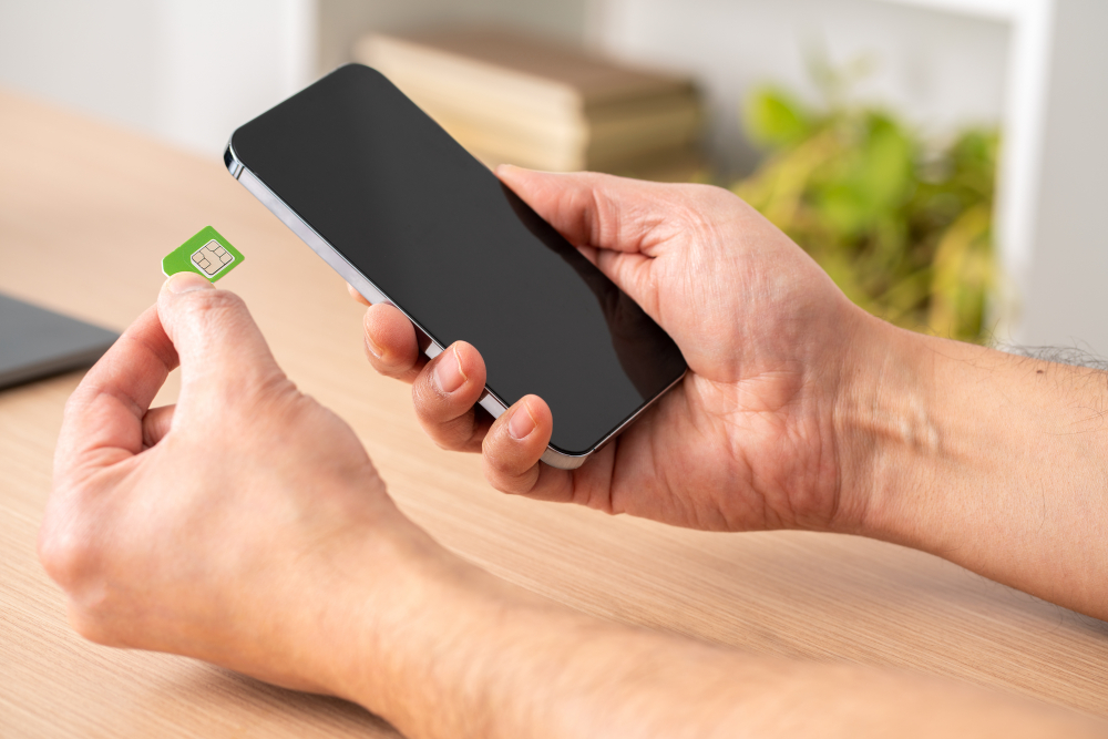 Insert a SIM card for Japan travel into a smartphone