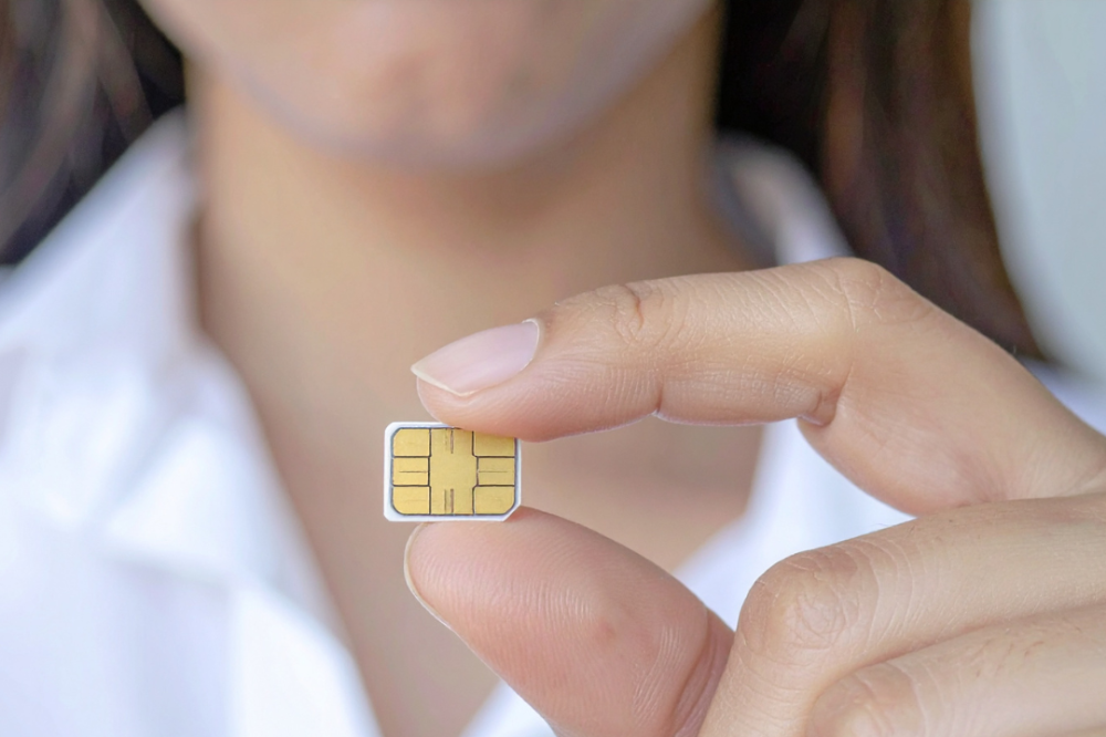 A female tourist in Japan using a SIM card