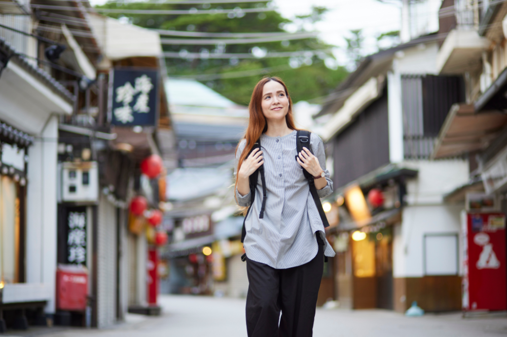 A woman traveling in Japan, connected via eSIM