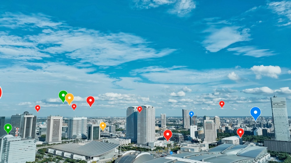 Aerial cityscape with colorful Google Fi location pins overlaid across the skyline