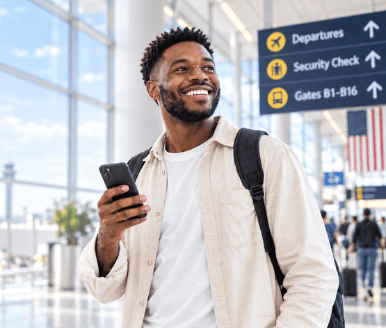 Traveler using an eSIM at an airport